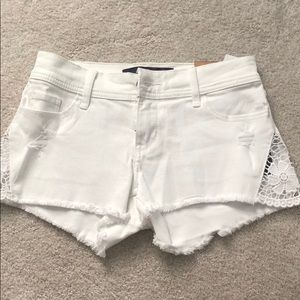Hollister white denim shorts with lace sides